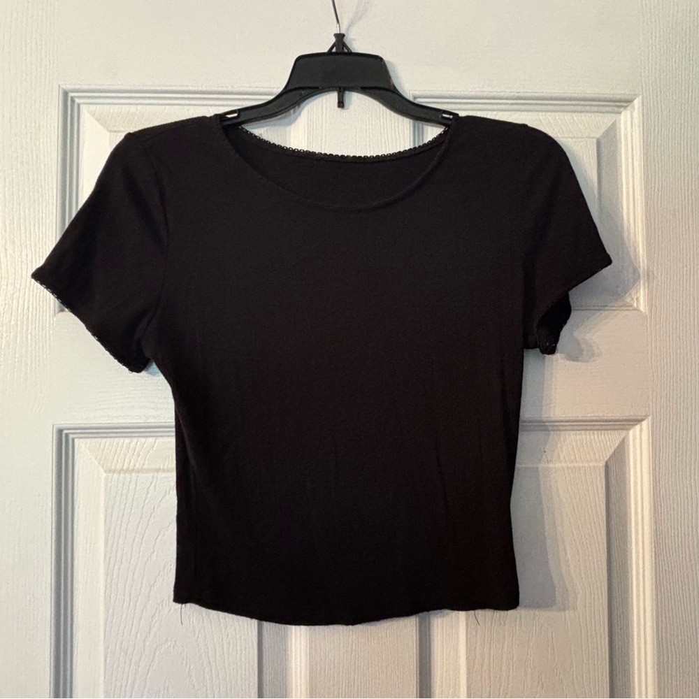 Black crop top, tight fitting, brand “SO”, worn a few times!